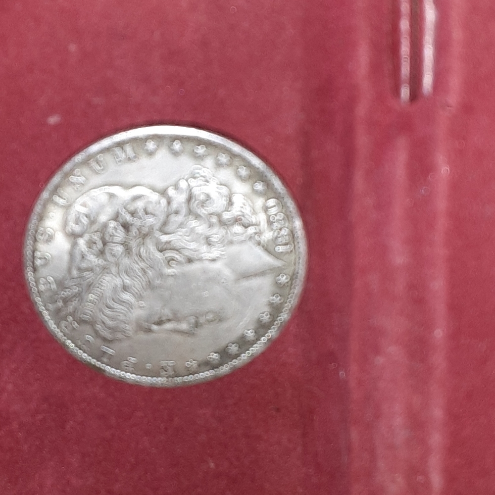 3 Morgan  silver  dollars